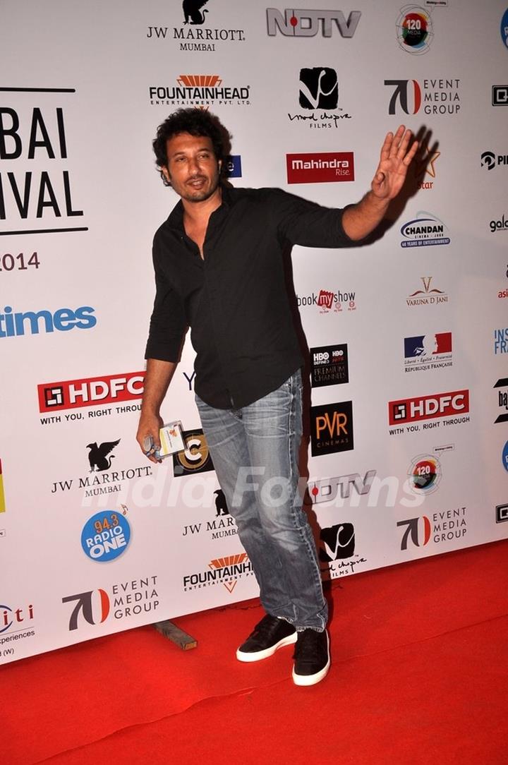 Homi Adajania poses for the media at the 16th MAMI Film Festival