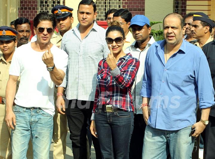 Shah Rukh Khan and Gauri Khan snapped outside their polling booth