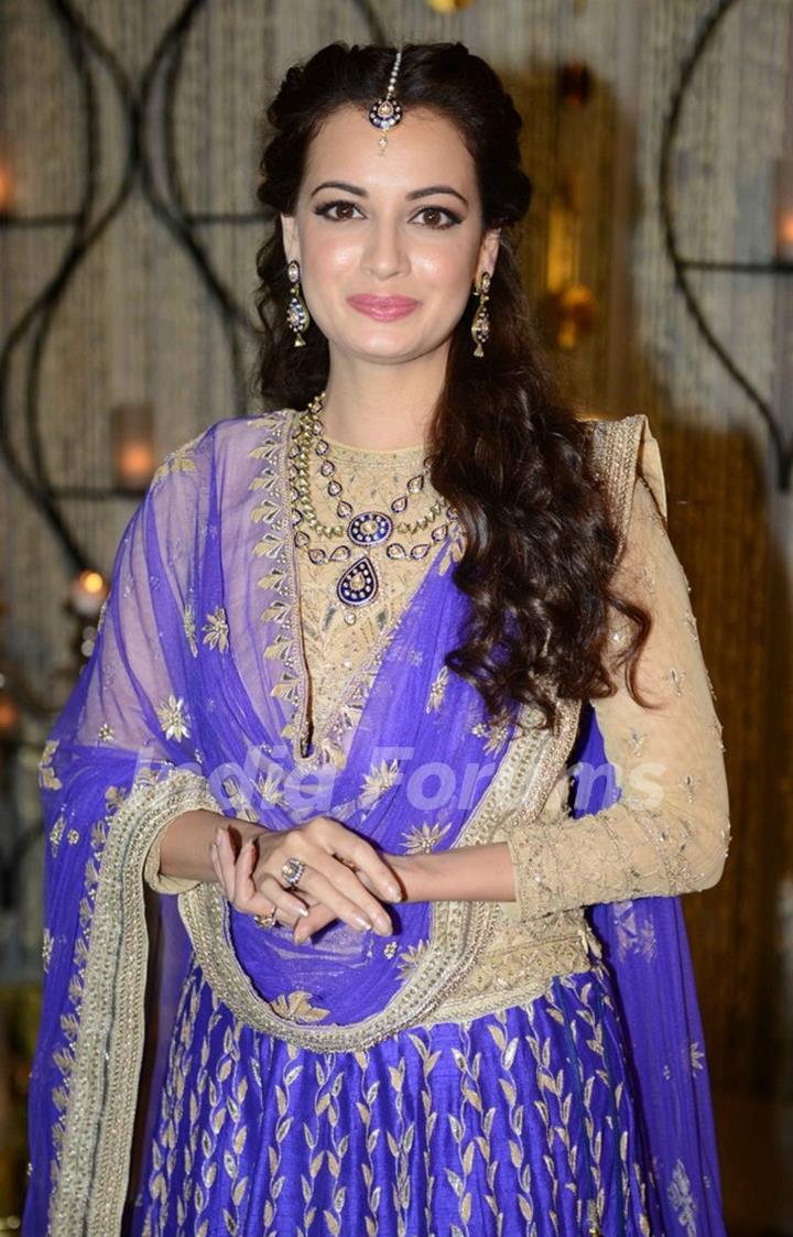 Dia Mirza poses for the media at her Sangeet Ceremony