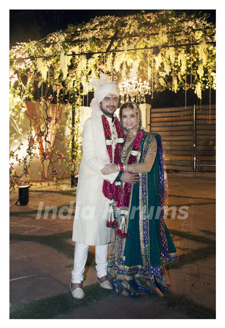 Dia Mirza and Sahil Sangha poses for the media post their wedding