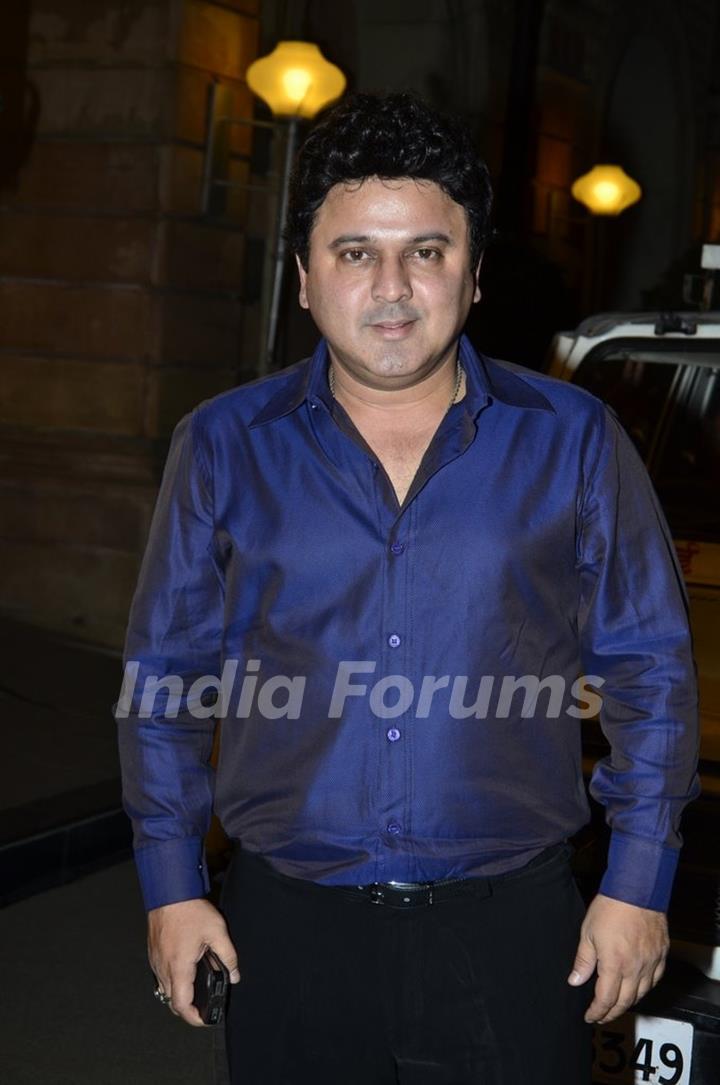 Ali Asgar poses for the media at SBS Party