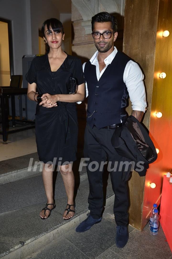 Karan Singh Grover poses with a friend at SBS Party