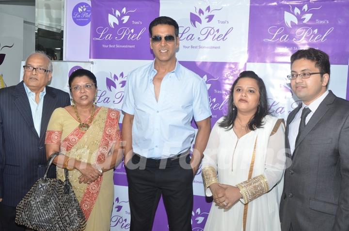 Akshay Kumar poses with guests at Dr. Trasi's La Piel Clinic