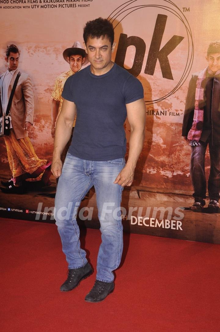 Aamir Khan poses for the media at the Teaser Trailer Launch of P.K.