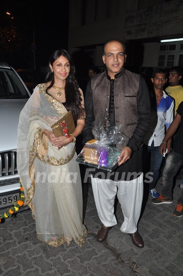 Ashutosh Gowarikar poses with wife at Aamir Khan's Diwali Bash
