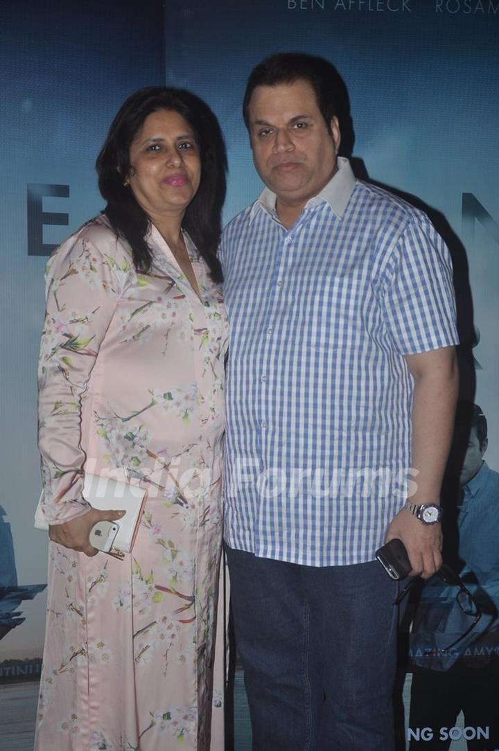 Ramesh Taurani poses with wife at a Screening at Light box