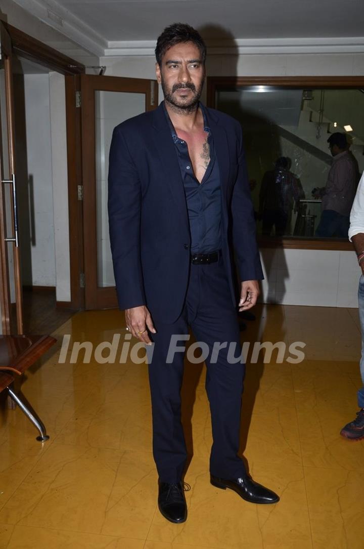 Ajay Devgn poses for the media on the Sets of KBC 8