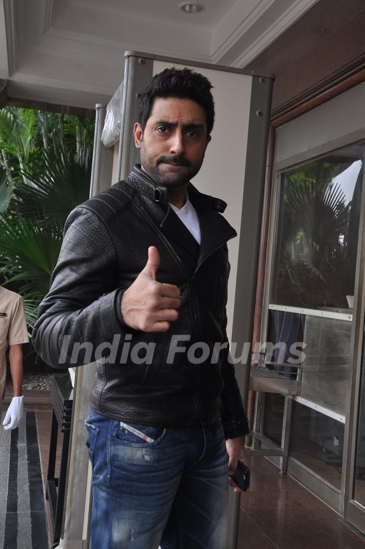 Abhishek Bachchan poses for the media at Happy New Year Game Launch