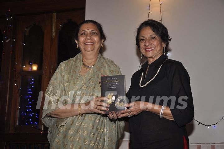Tanuja poses with Bimal Roy's Book at the Launch