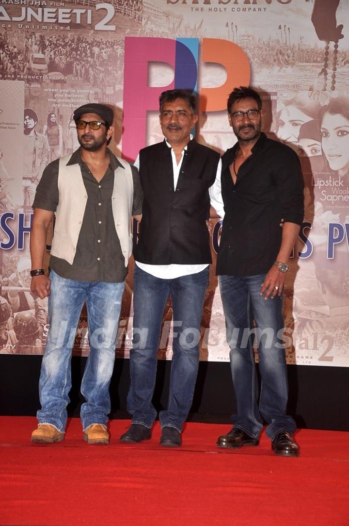 Arshad Warsi, Prakash Jha and Ajay Devgn  pose for the media at the Launch of Rajneeti 2