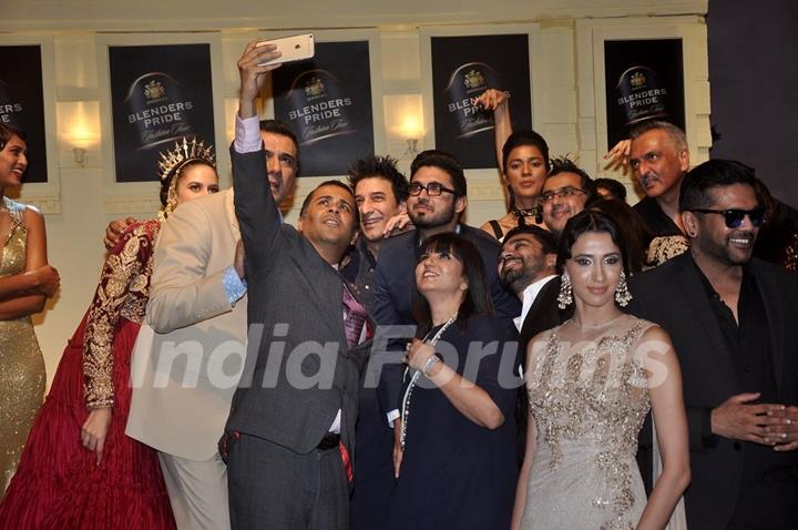 Chetan Bhagat clicks a selfie with friends at Blender's Pride Tour