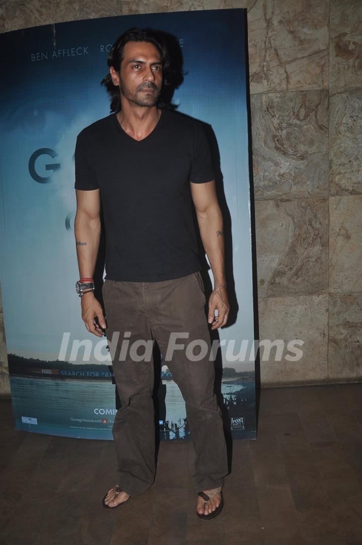 Arjun Rampal poses for the media at the Screening of Gone Girl