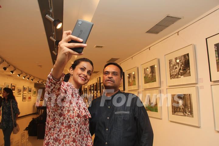 Gul Panag clicks a selfie with a friend at Melted Core Photo Exhibition