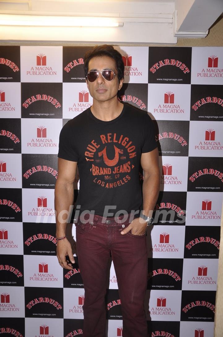 Sonu Sood poses for the media at the Launch of New Edition of Stardust Rising