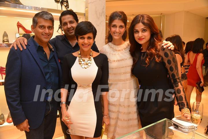 Celebs pose for the media at Michael Korrs Store Launch