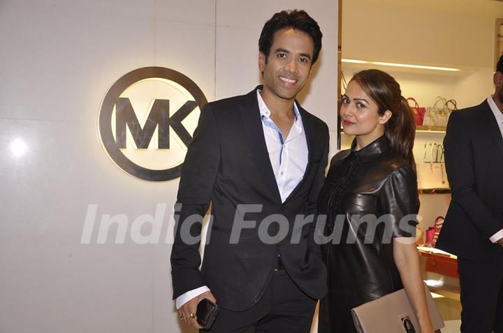 Amrita Arora poses with Tusshar Kapoor at Michael Korrs Store Launch