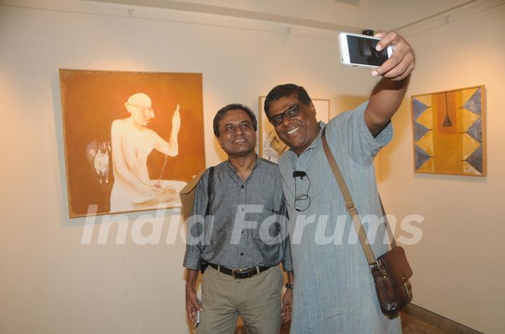 Ashish Vidyarthi clicks a selfie with a friend at the Inauguration of a Special Art Exhibition