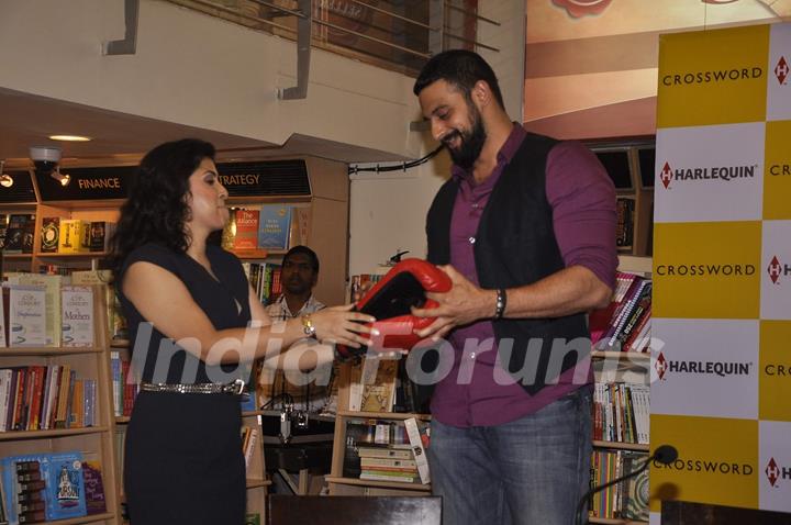 Nidhie Sharma snapped giving boxing gloves to Arunoday Singh at her Book Launch