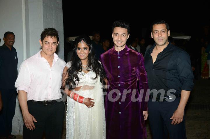 Aamir Khan and Salman Khan pose with the newly wedded couple at Flaknuma Palace