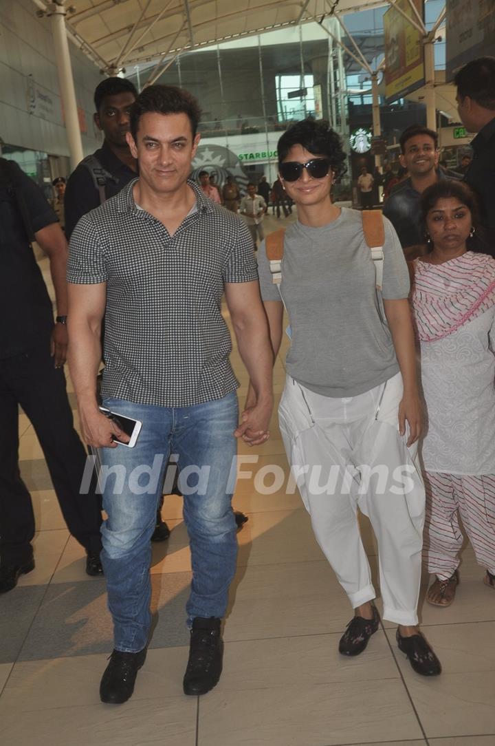 Aamir Khan and Kiran Rao snapped at airport while returning from Arpita Khan's Wedding