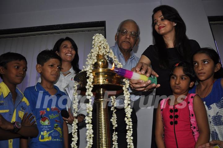 Aishwarya Rai Bachchan lights the lamp at Smile Train Organisation