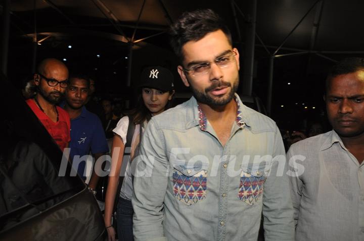 Virat Kohli makes a funky face for the camera at Airport