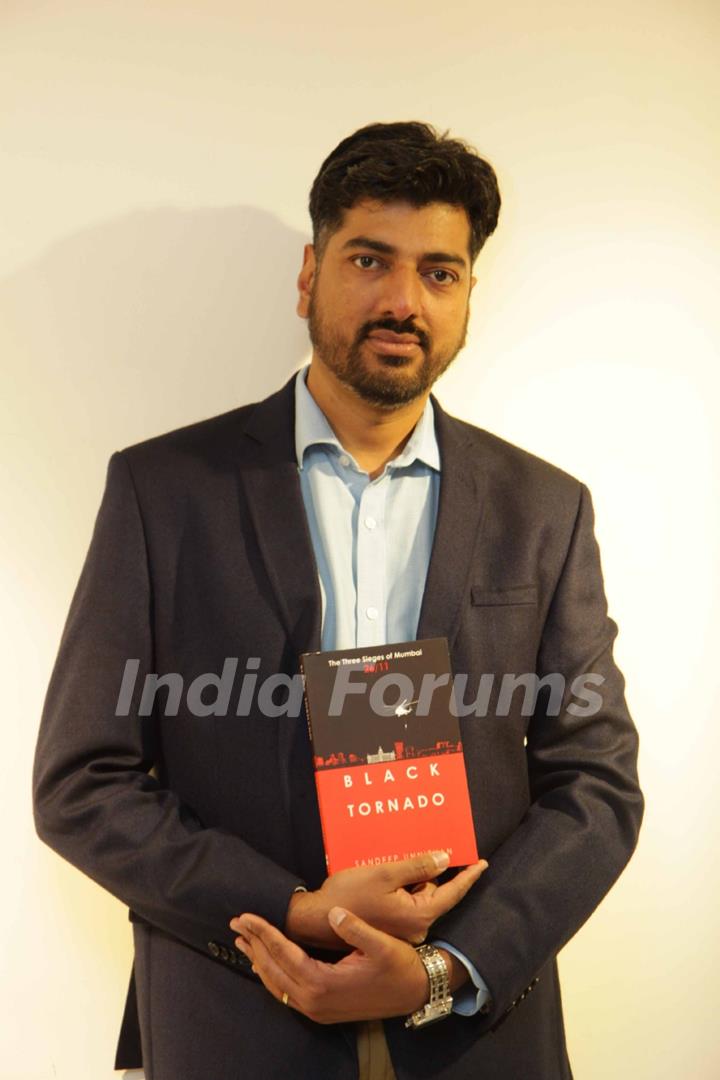 Sandeep Unnithan poses with his Book Black Tornado at the Launch