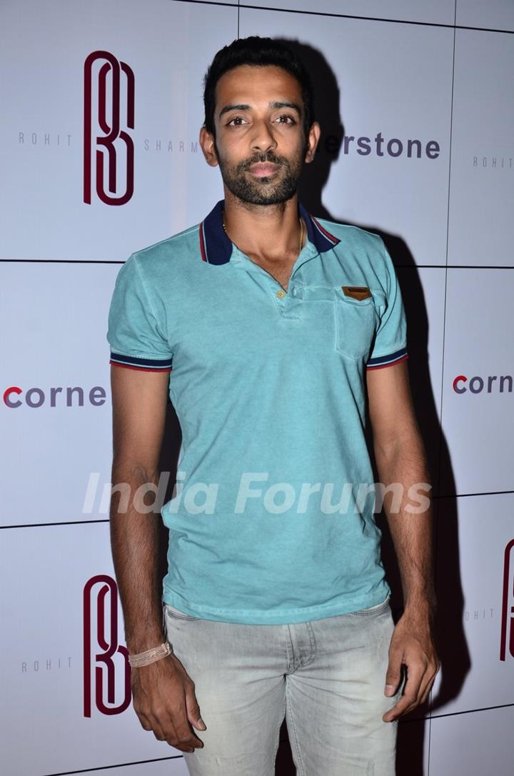 Dhawal kulkarni poses for the media at Rohit Sharma's Bash