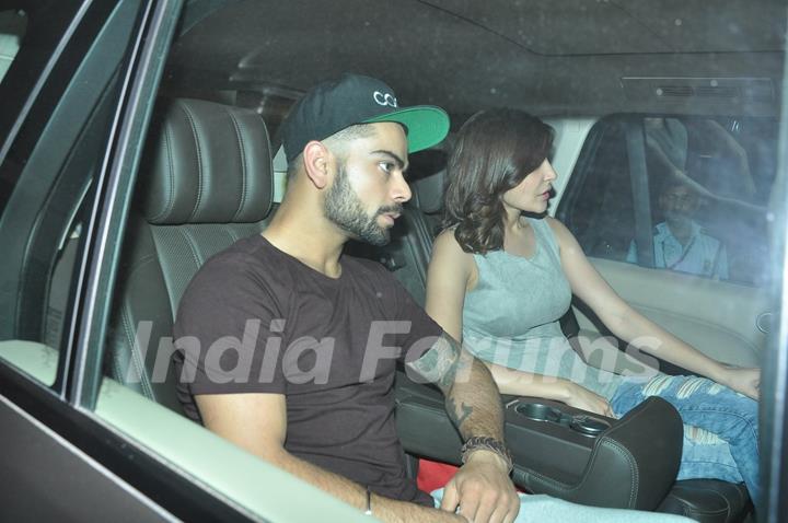 Anushka Sharma and Virat Kohli were snapped in their car at at Karan Johar 's Bash