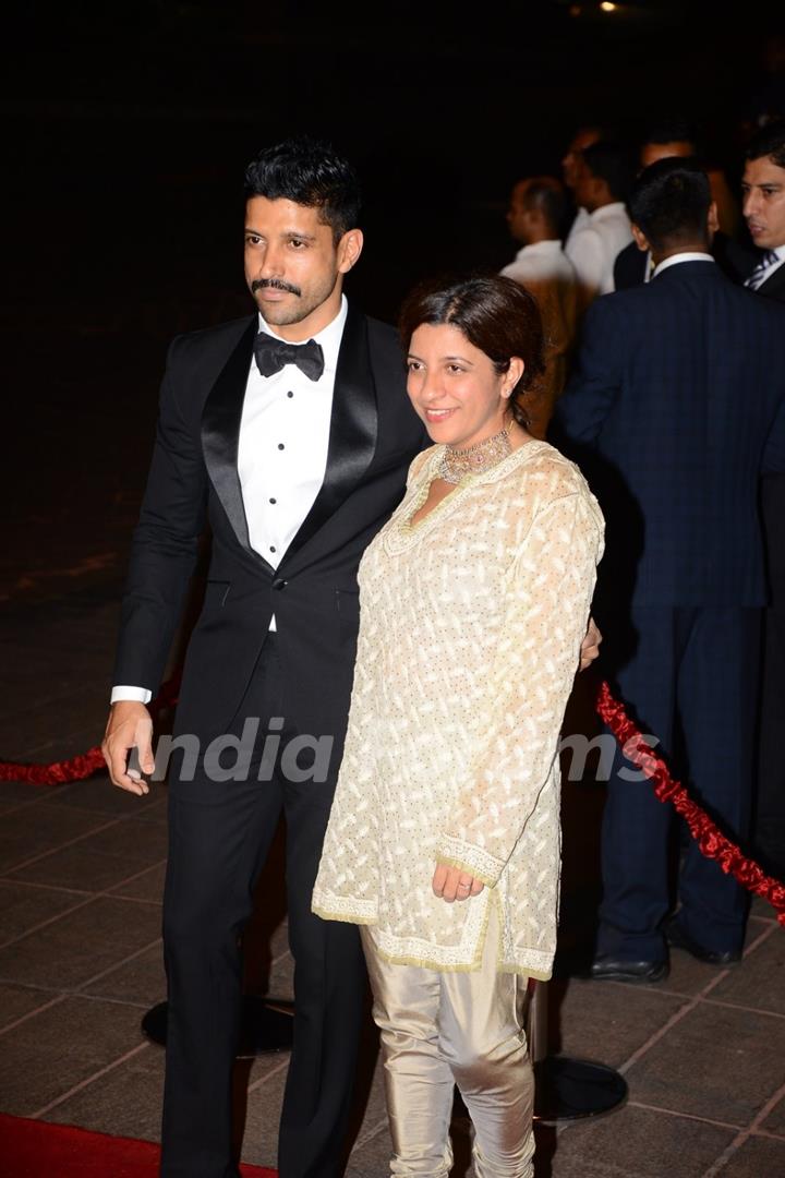 Farhan Akhtar and Zoya Akhtar pose for the media at Arpita Khan's Wedding Reception