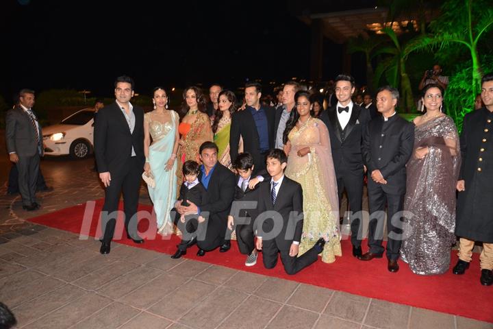 The Khan Family poses with the newly wedded Couple at the Reception