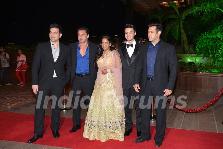 Arpita and Aayush pose with the Khan Brothers at their Wedding Reception