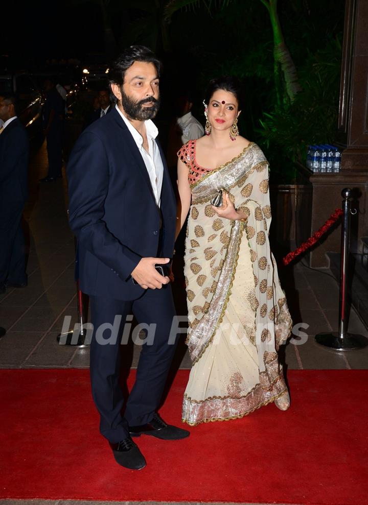 Bobby Deol poses with wife at Arpita Khan's Wedding Reception