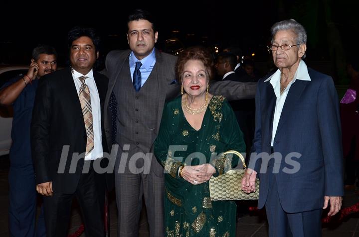 Armaan Kohli poses with his Parents at Arpita Khan's Wedding Reception