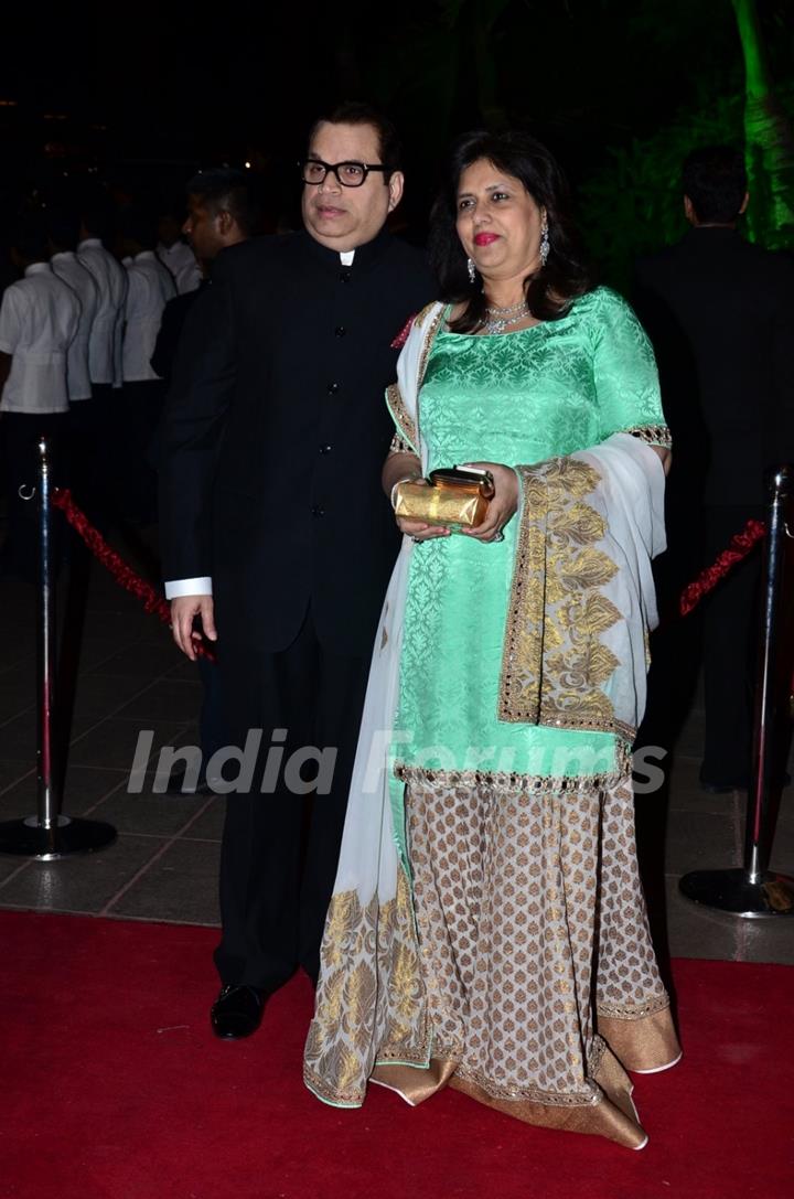 Ramesh Taurani poses with wife at Arpita Khan's Wedding Reception