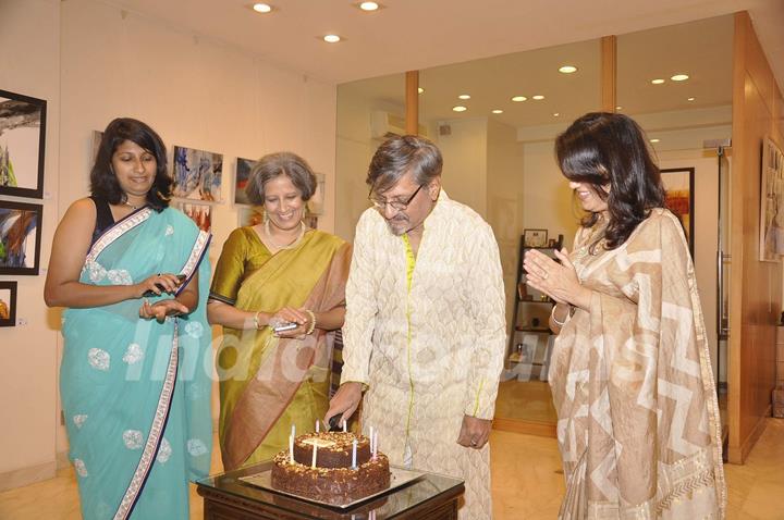 Amol Palekar cuts a cake at his Art Exhibition