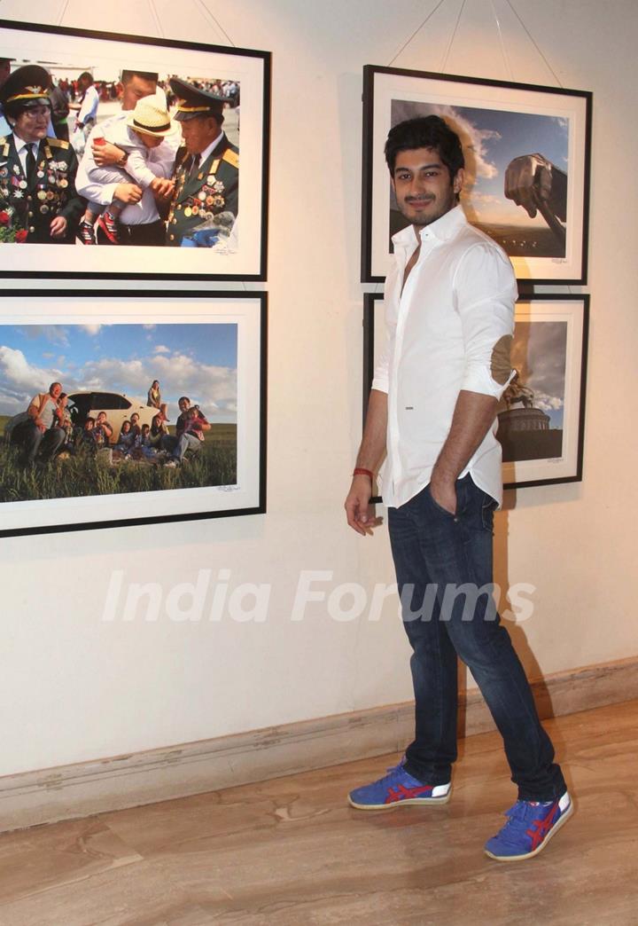 Mohit Marwah poses for the media at Mongolia Day, An Art Exhibition by Shantanu Das