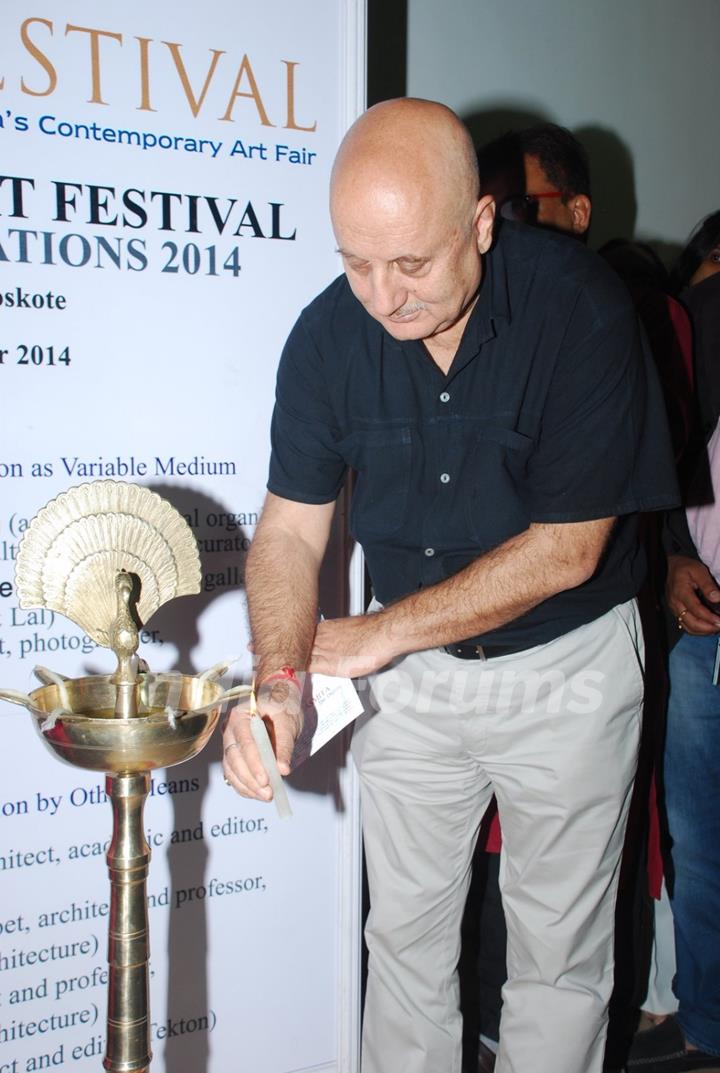 Anupam Kher lights the lamp at the Inauguration of India Art Festival