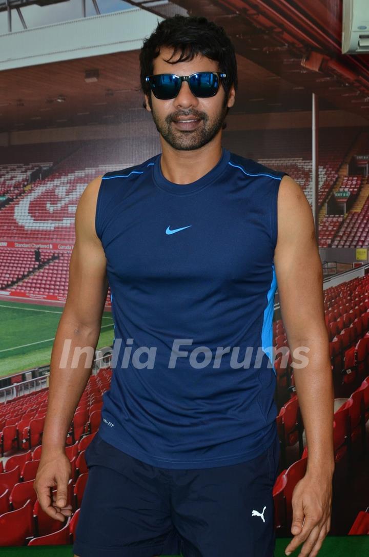 Shabbir Ahluwalia poses for the media at Barclays Premier League