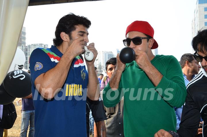 Ranbir Kapoor and Aditya Roy Kapur were snapped blowing balloons at Barclays Premier League