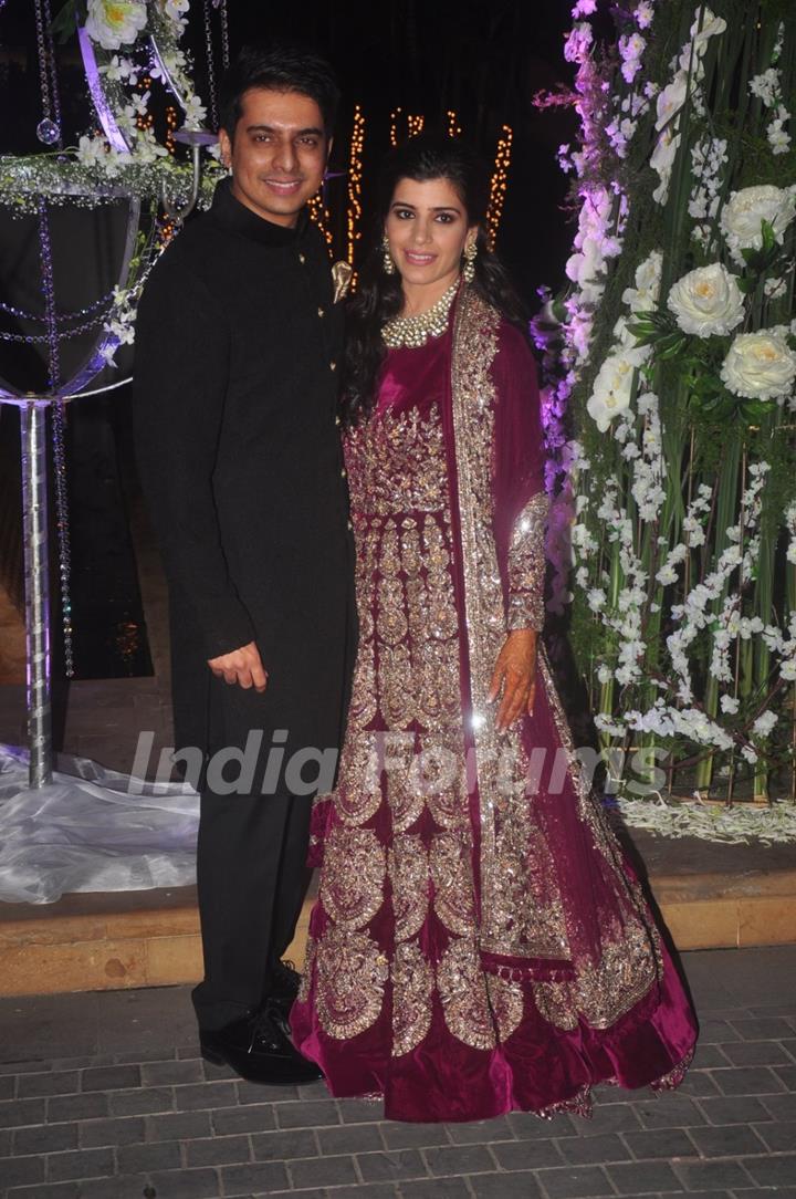 Riddhi Malhotra and Tejas Talwalkar pose for the media at their Sangeet Ceremony