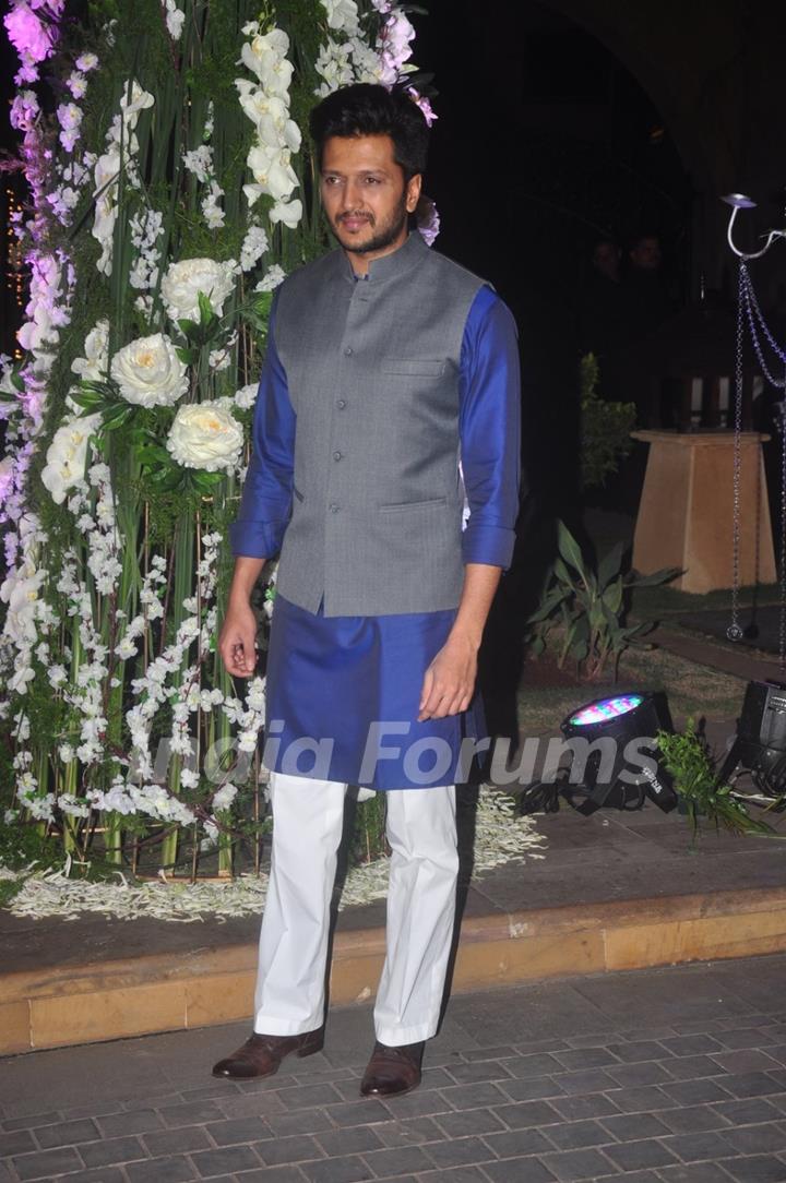 Riteish Deshmukh poses for the media at the Sangeet Ceremony of Riddhi Malhotra and Tejas Talwalkar