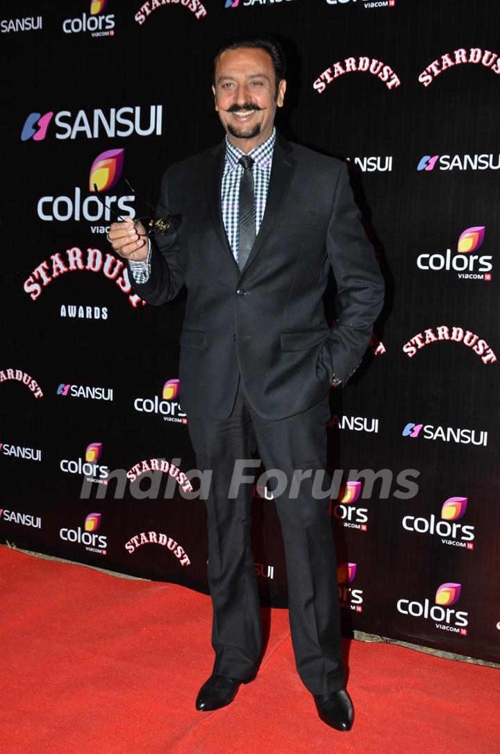 Gulshan Grover poses for the media at Sansui Stardust Awards Red Carpet