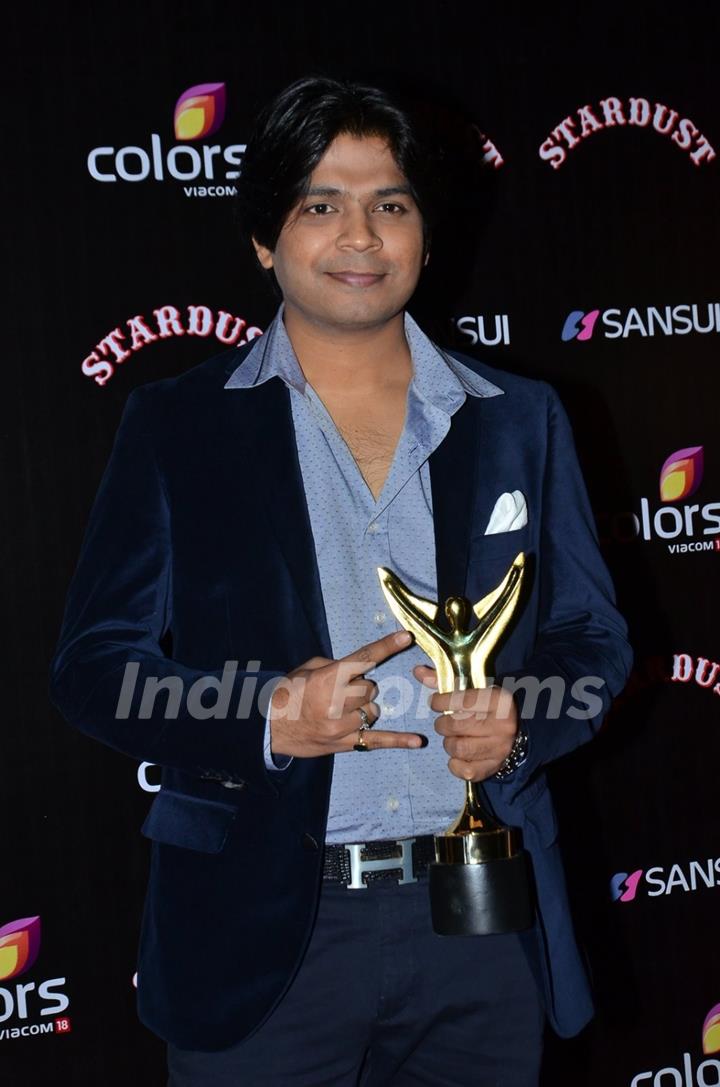 Ankit Tiwari poses for the media at Sansui Stardust Awards Red Carpet