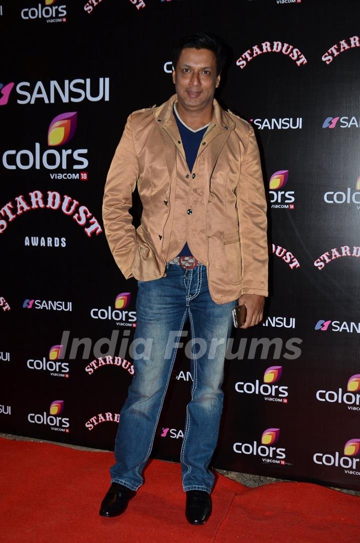 Madhur Bhandarkar poses for the media at Sansui Stardust Awards Red Carpet