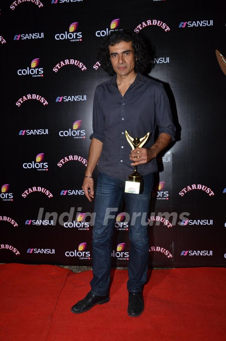 Imtiaz Ali poses for the media at Sansui Stardust Awards Red Carpet