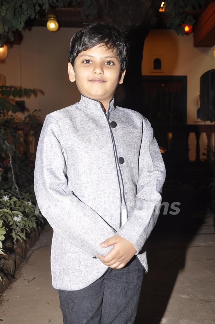 Child Artist who plays the younger Rudra in Mahakumbh poses for the media at the Launch