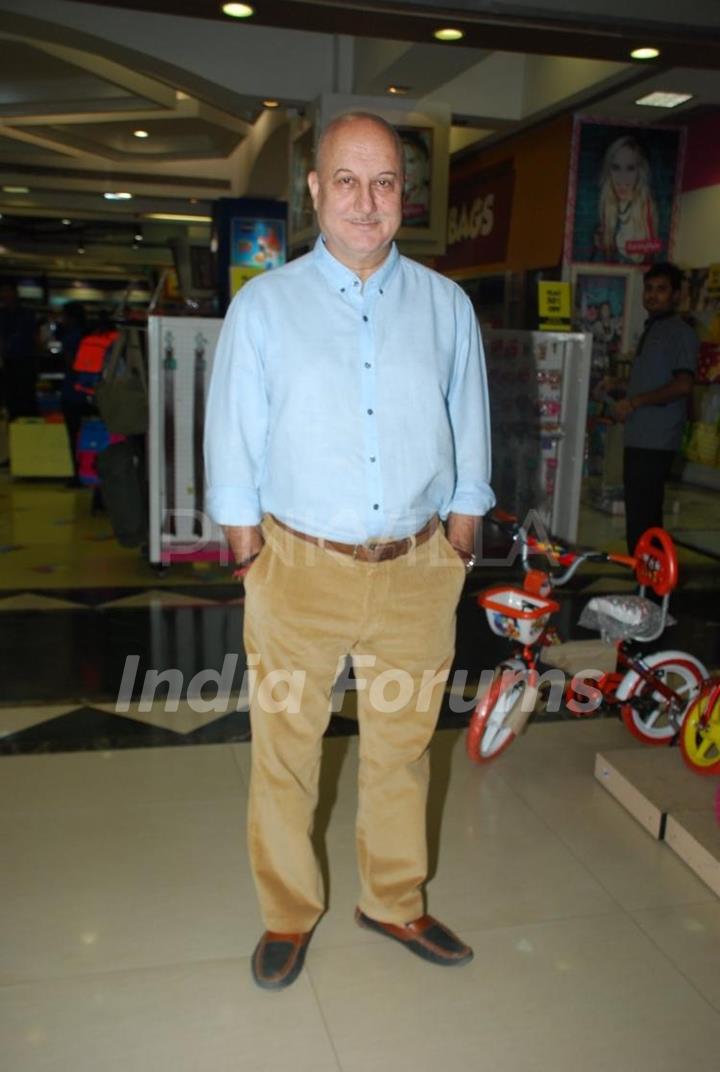 Anupam Kher poses for the media at the Book Launch of 'Once Upon a Star'