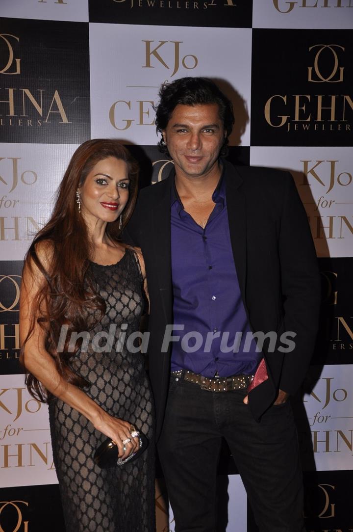 Chetan Hansraj poses with a friend at GEHNA Jewelers Collection Launch 'KJO FOR GEHNA'