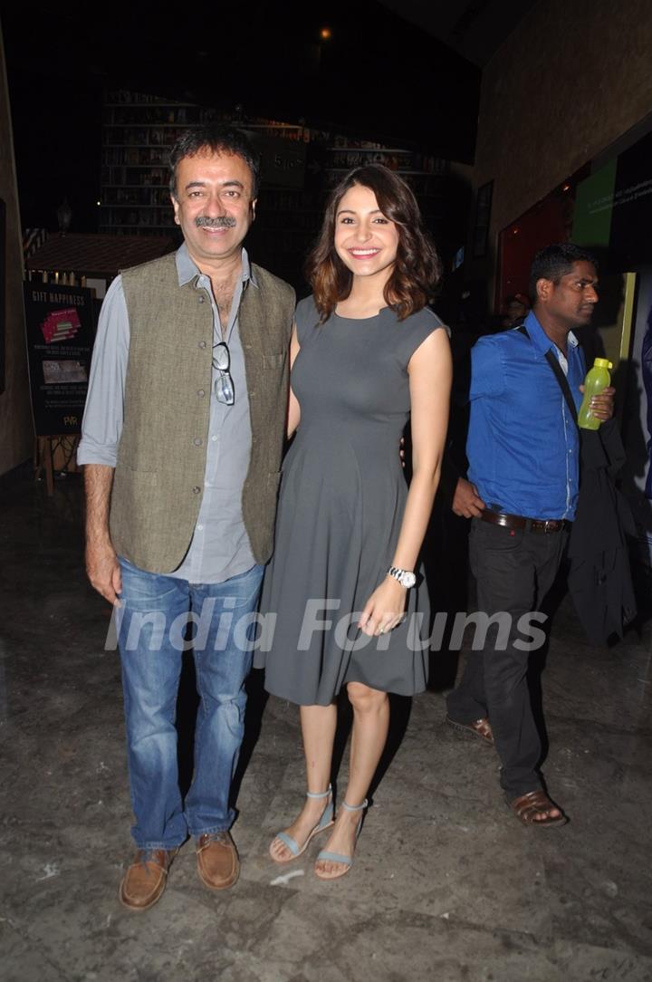 Anushka Sharma poses with Rajkumar Hirani at the Special Screening of P.K. for the Cast and Crew